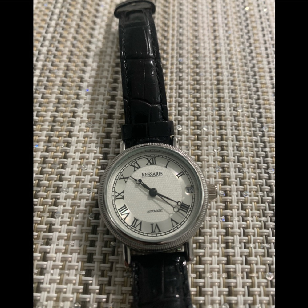 Kessaris cristal clear back watch.